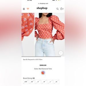 Crisp, lightweight, and finished with a fresh print, CAROLINE CONSTAS crop top